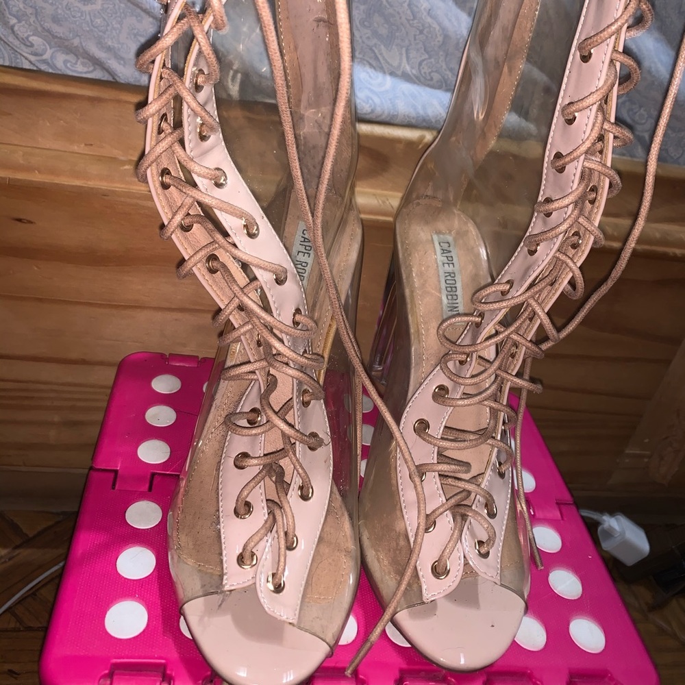 Lace up clear perspex heels.